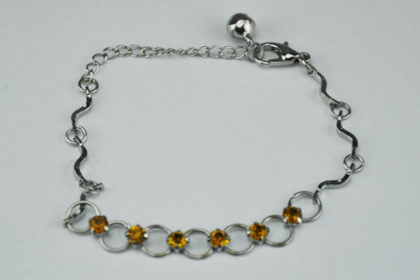 Metall-Armband 15 - 19.5cm mit feinen orangen Kristallen
